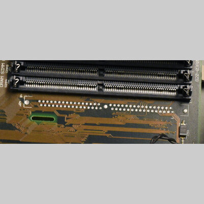 Photo of motherboard with empty ROM socket.