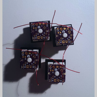 image of threading wires between single key PCBs